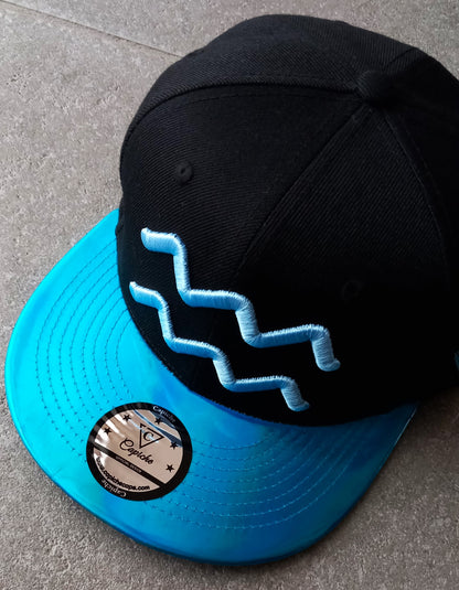 Aquarius Black Snapback Hat with Blue Metallic Brim Zodiac Sign from Capiche Caps