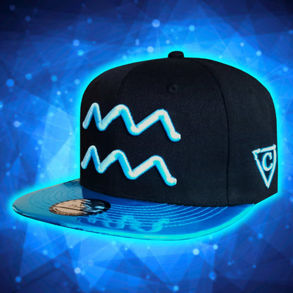 Front View of Aquarius Black Snapback Hat with Blue Metallic Brim Zodiac Sign from Capiche Caps