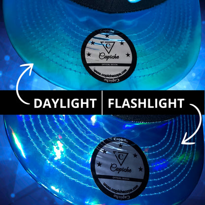 Aquarius Black Snapback Hat with Blue Metallic Brim in Daylight and Flashlight