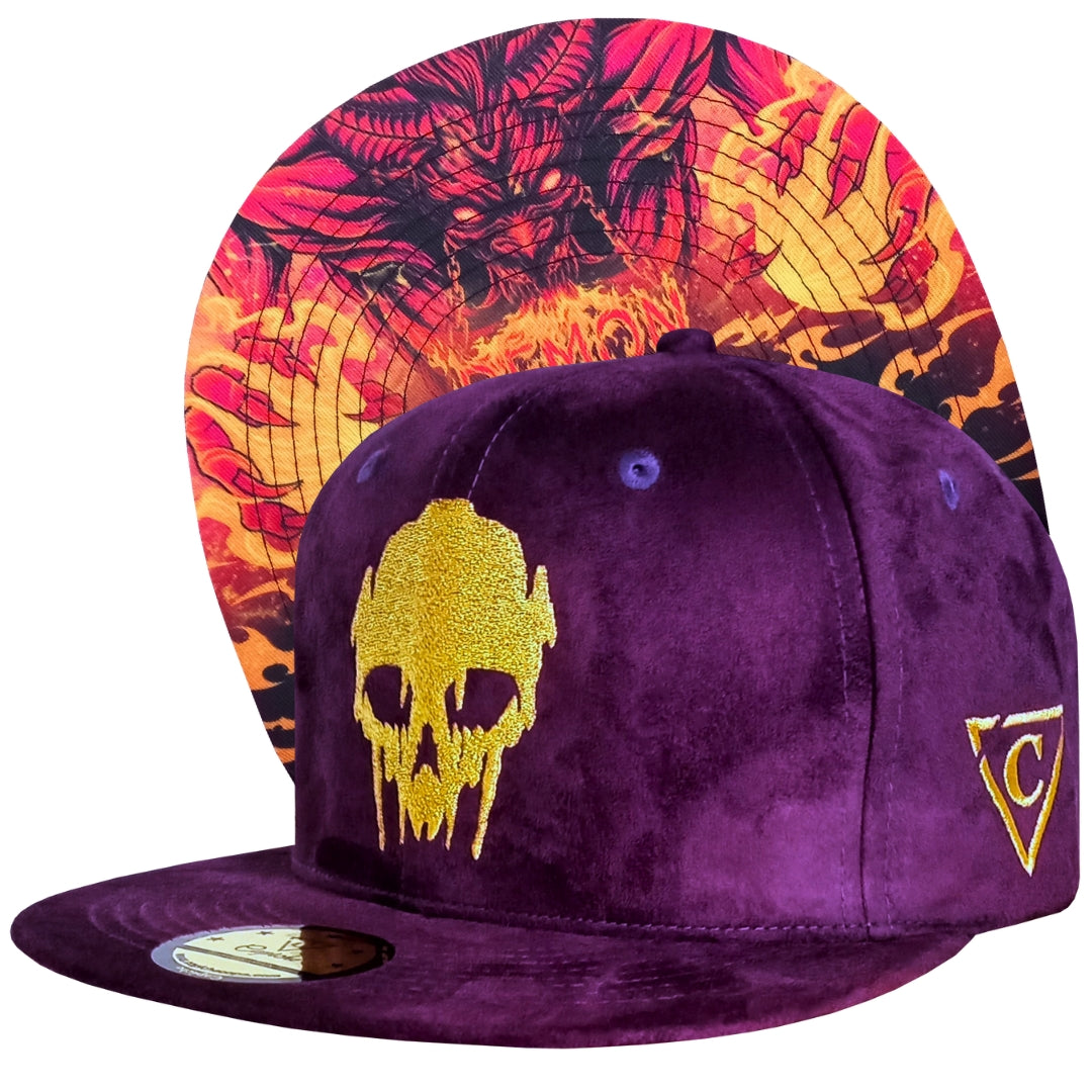 Purple cap with gold skull design and colorful patterned interior on a white background