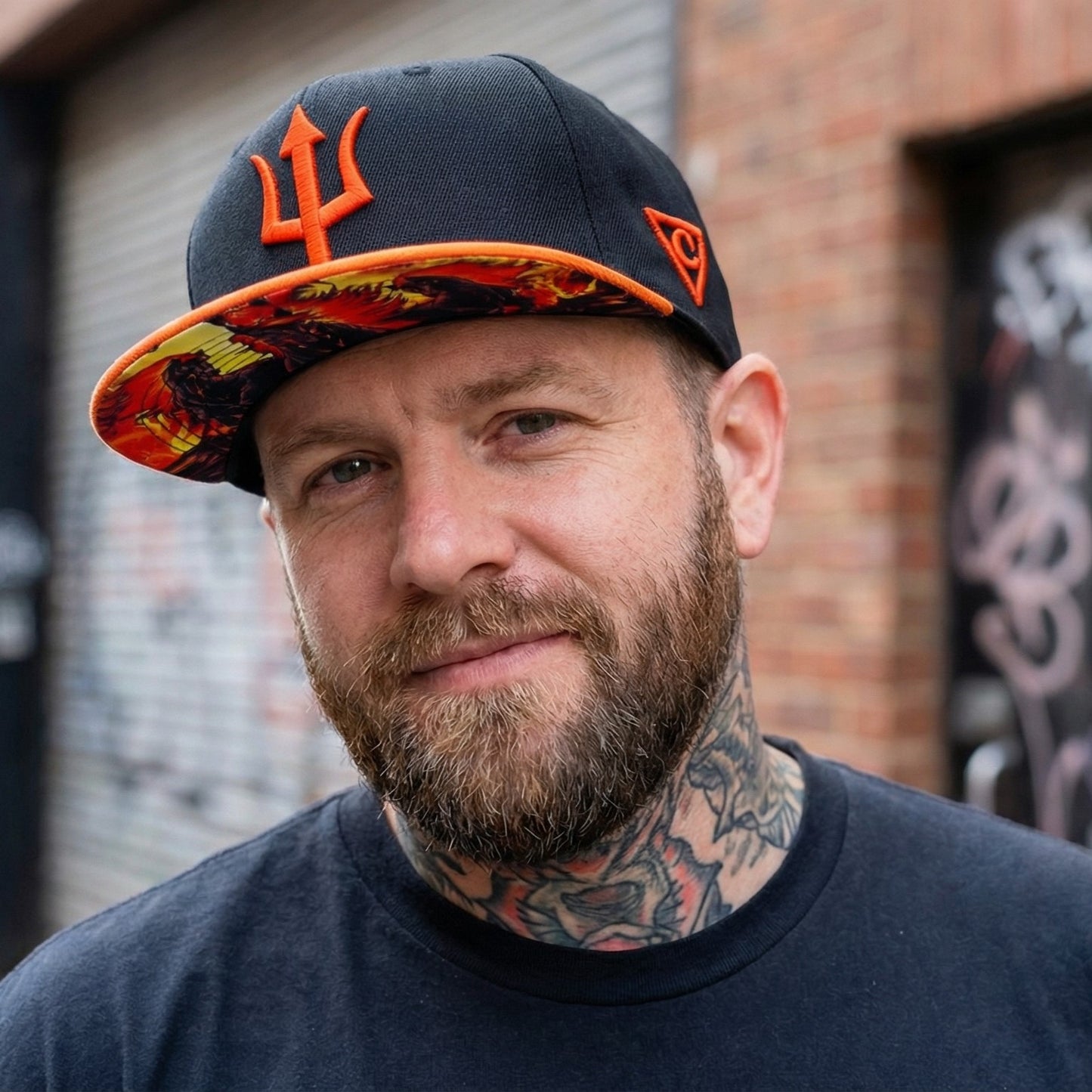 Snapback Aethon - czarno-pomarańczowy