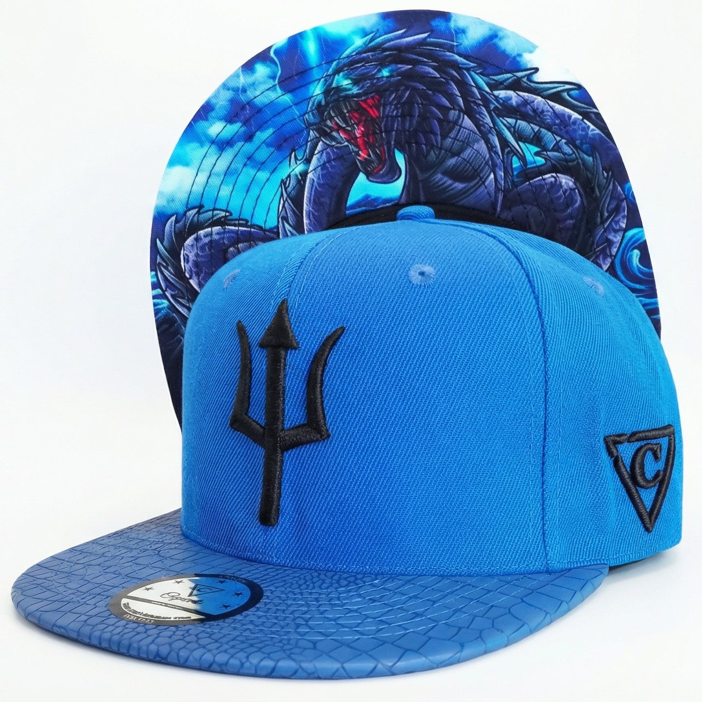 Gorra Snapback Basilisk - Azul y cuero artificial