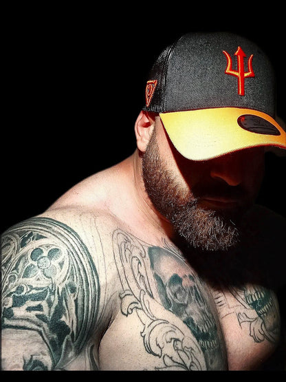 Black Orange Trucker Cap Aethon on Tattoo Model from Capiche Caps (8).jpg