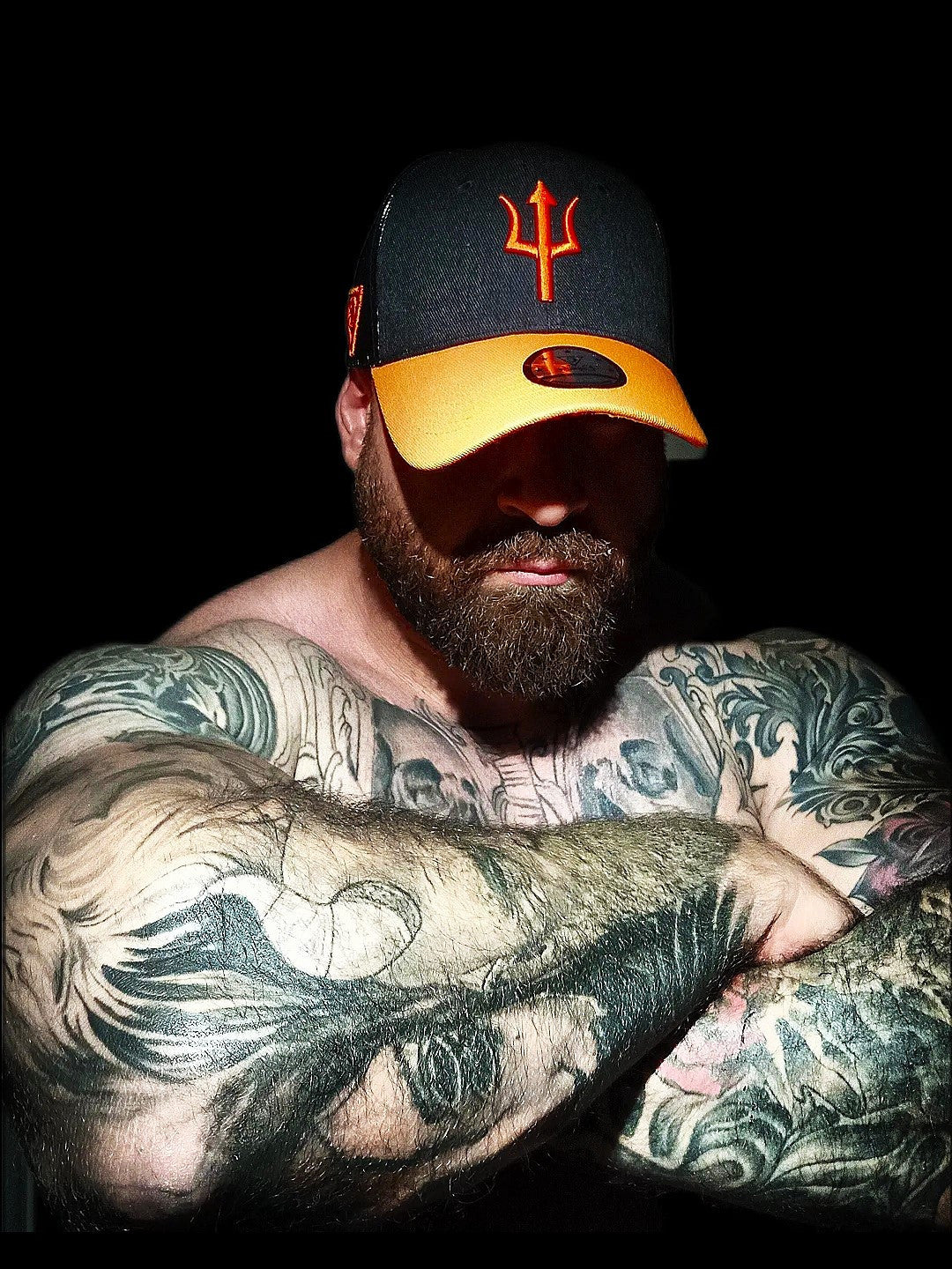 Black Orange Trucker Cap Aethon on Tattoo Model from Capiche Caps (9).jpg